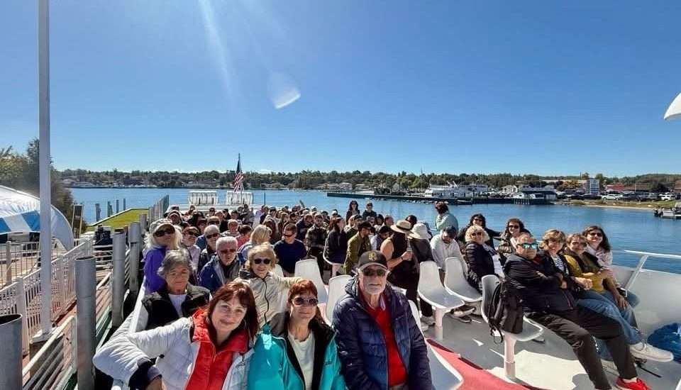 Members and friends of the Golden Time Club on the ferry to Mackinac Island